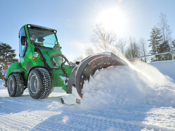 Tractor plowing snow